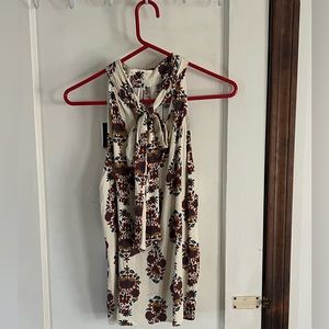 1.State multicolor halter style top. NWT